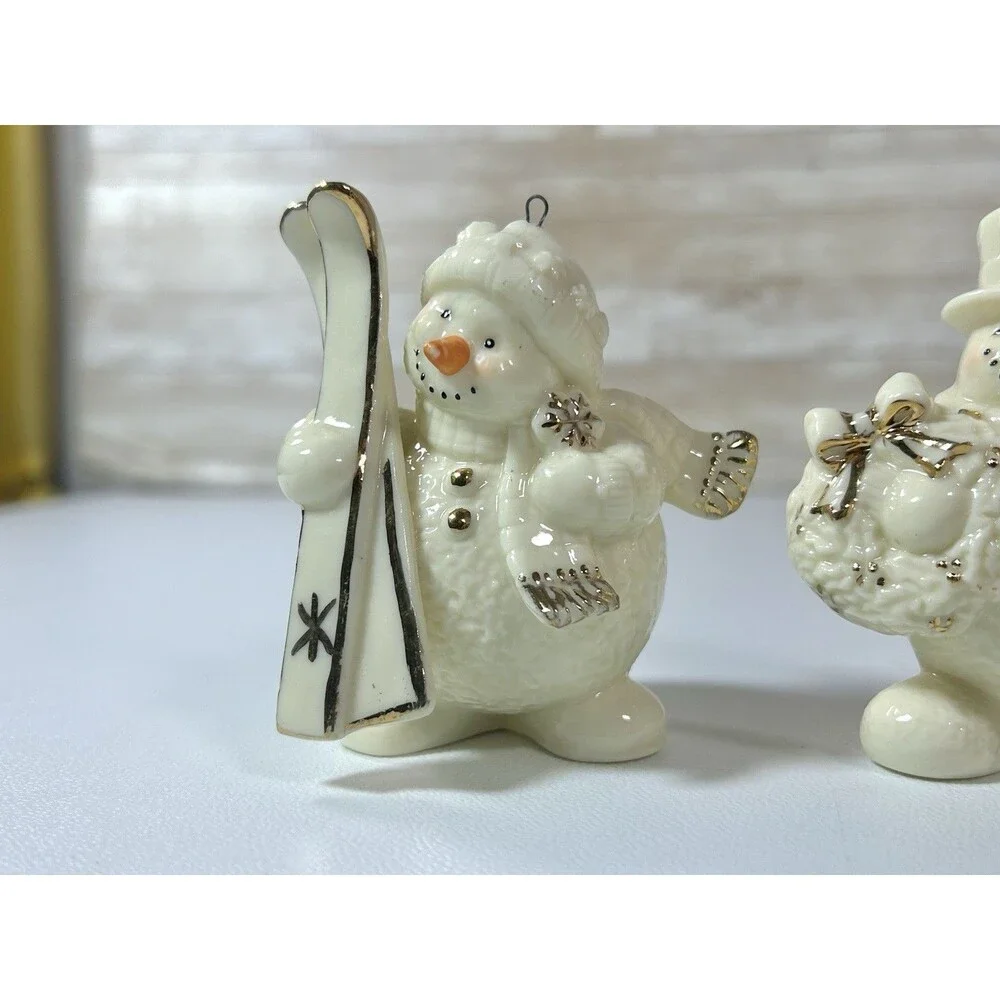 Vtg Porcelain Jade Snowman Ornaments Set Of 2 Ski Broom White Gold Color Accent